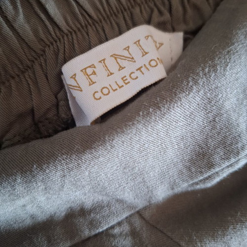 Infinity Collection khaki pants used, 100% viscose, sizes S-M