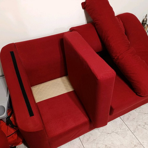 Two-seater waterproof sofa like new with removable cushions