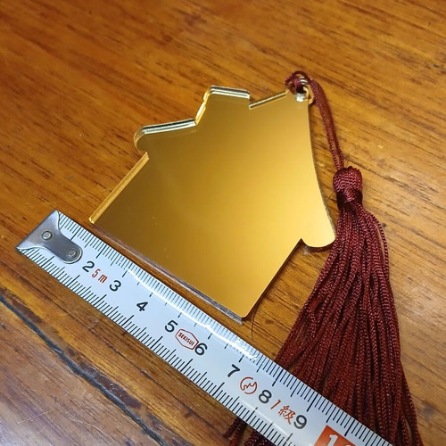 House-shaped plexiglass mirror charm new with burgundy tassel