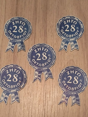 Collectible paper badges 28th October like new, pack