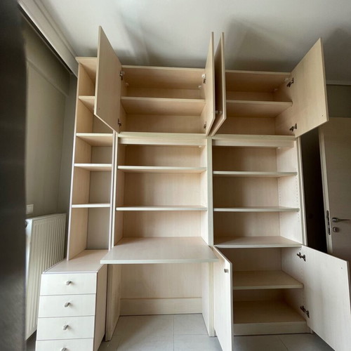Bookcase desk with shelves, cabinets, drawers and office chair used
