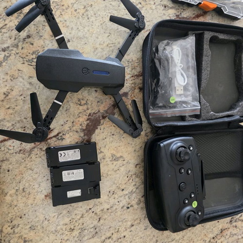 Drone new with 3 batteries, case and spare propellers