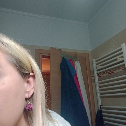 Pon pon animal print fuchsia earrings used