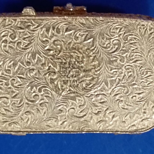 Vintage powder compact used with stone on lid