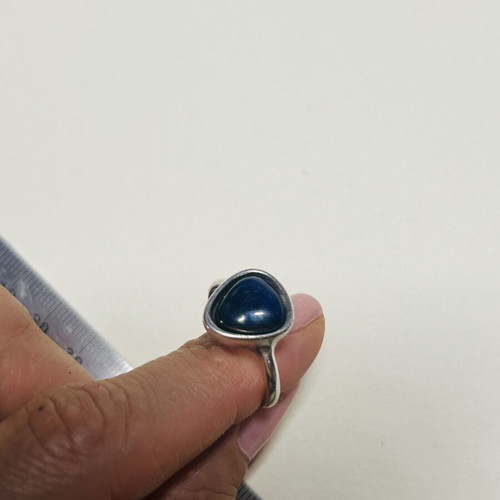 Silver ring with dark blue agate stone