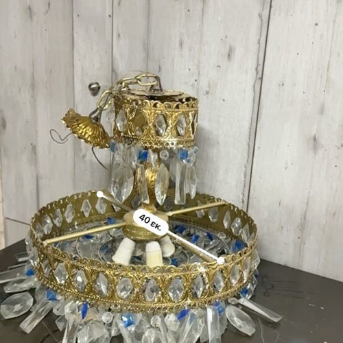 Vintage gold chandelier used with crystals and blue details