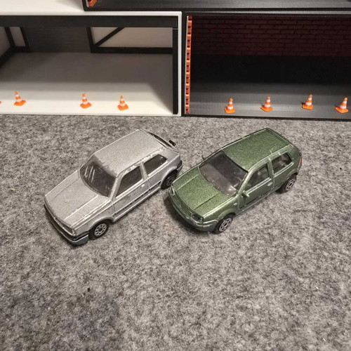 Golf 1/56 and Golf IV GTI 1/57 used, set of 2 toy cars