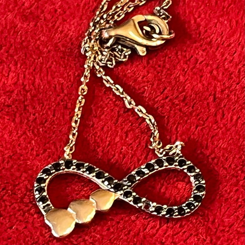 Silver 925 necklace with gold vermeil coating, infinity design with gold hearts, used