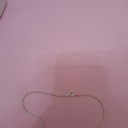 Silver chain with pendant like new, pendant not silver