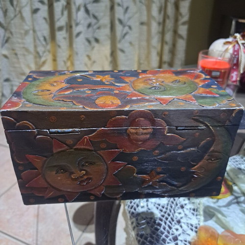 Wooden carved box like new with sun and moon design