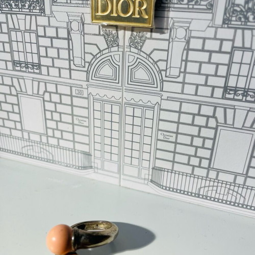 Silver ring with pink pearls used