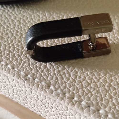 Prada cufflinks with leather zip case like new, black metal and leather