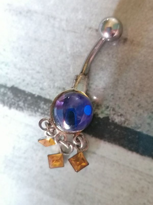 Aurora borealis navel piercing with color-changing crystal