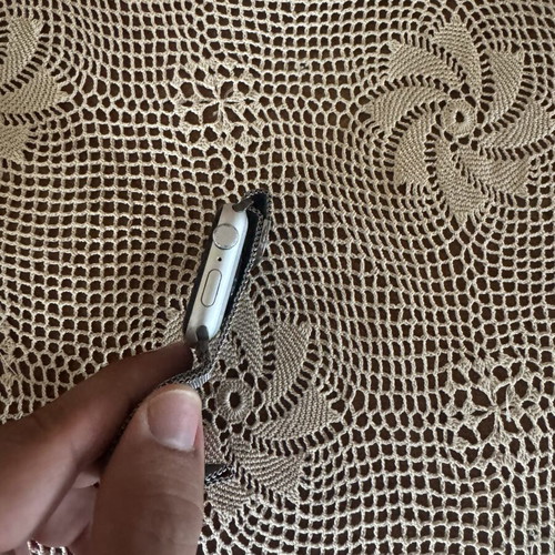 Apple AirPods 3rd Gen and Apple Watch SE 44mm used with accessories