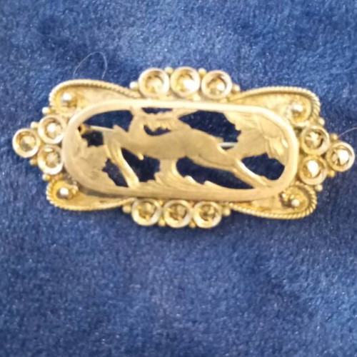 Silver-gold brooch used with Rodian technique and 9k deer motif