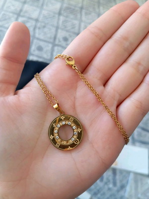 Women's necklace used, authentic, gold color, stainless steel