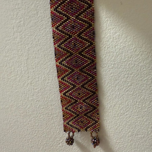 Handmade bead weaving bracelet like new, geometric design