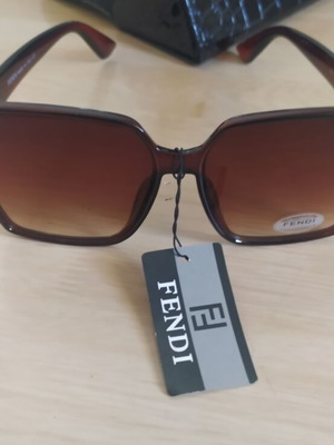 Fendi women's sunglasses new, brown with case