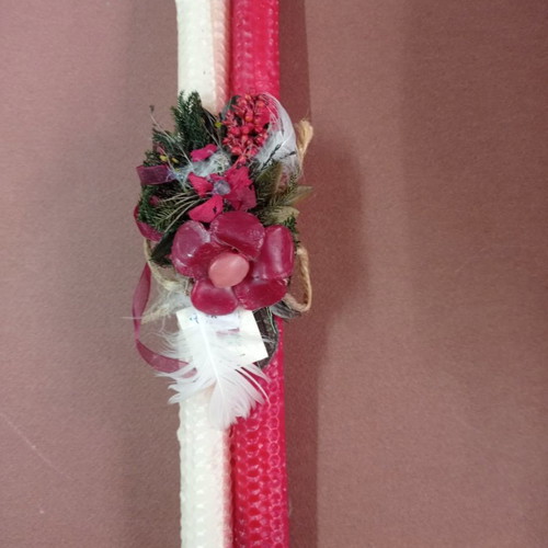 Easter candle new with wax decorations and dried flowers