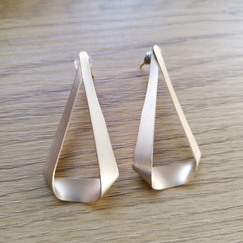 Chrysa dangling earrings like new, gold-colored