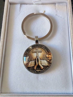 Metal keychain with round Christian pendant new