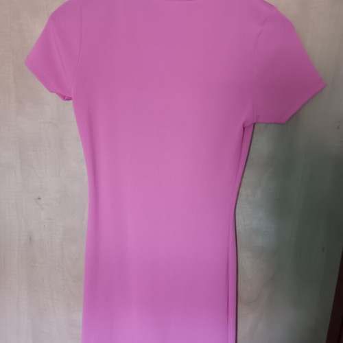 Pink mini dress like new, small size, short sleeves with slit and decorative buttons