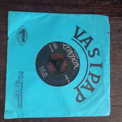 45 RPM vinyl record like new, pop genre