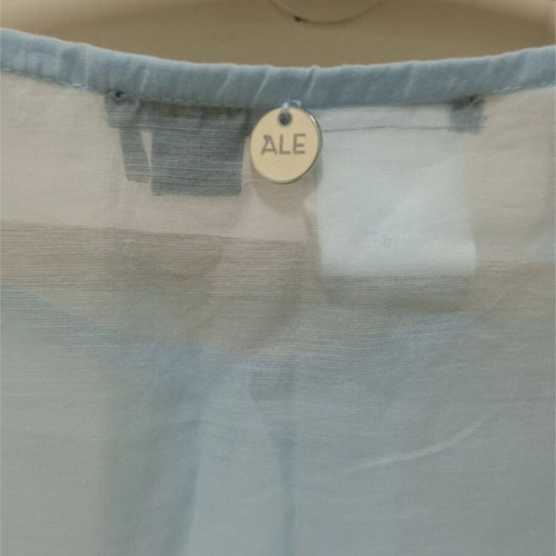 A.L.E. turquoise shirt like new, size XL fits L and M