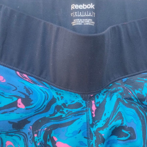 Reebok Play Dry sports leggings size S like new, blue and pink abstract