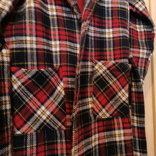 Checked coat size Small like new with belt and stitched pockets