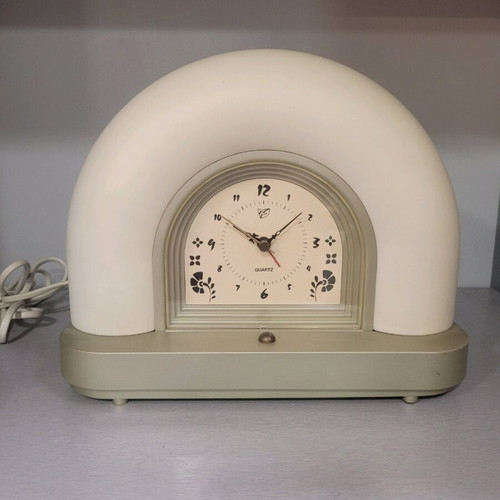 Touch clock and lamp that adjusts with touch