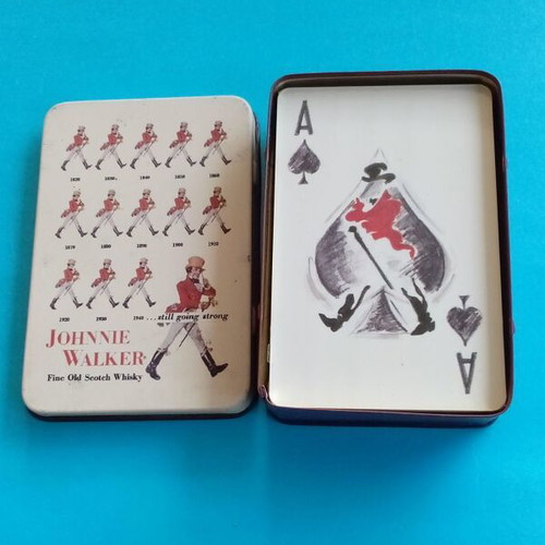 Johnny Walker collectible playing cards like new with metal case