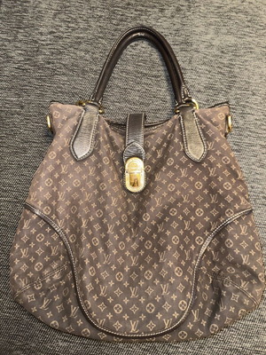 Louis Vuitton fabric brown bag used in very good condition