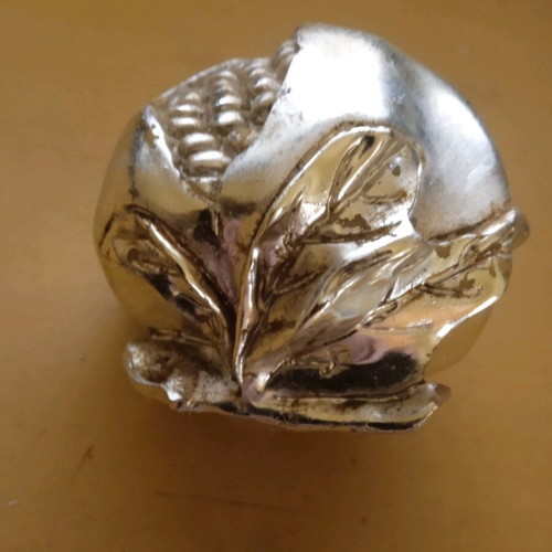 Embossed metal decorative pomegranate vintage used