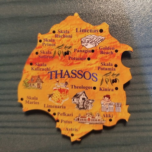 Set of 12 souvenir fridge magnets from various regions
