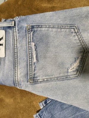 Calvin Klein mom jean used, size W30 with rips