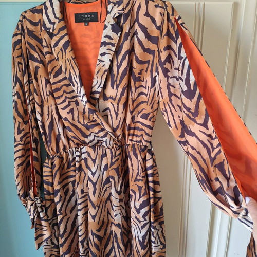 Lynne dress with animal print like new, size M