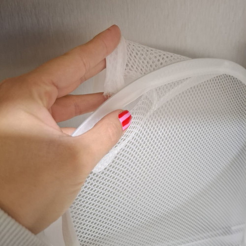 Foldable mesh storage basket white used for laundry and toys