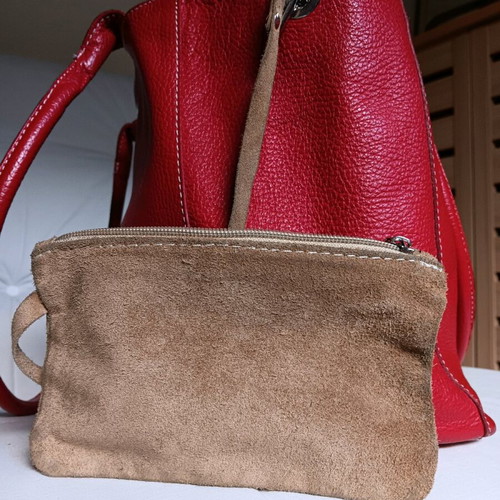 Red leather shoulder bag used with detachable wallet