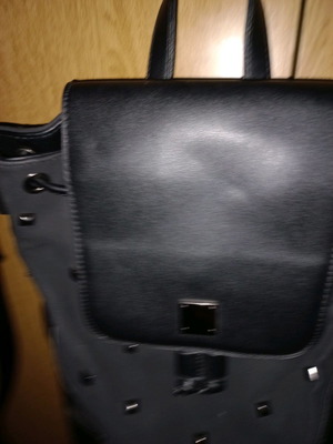 Crossbody bag new, black color, convertible to backpack