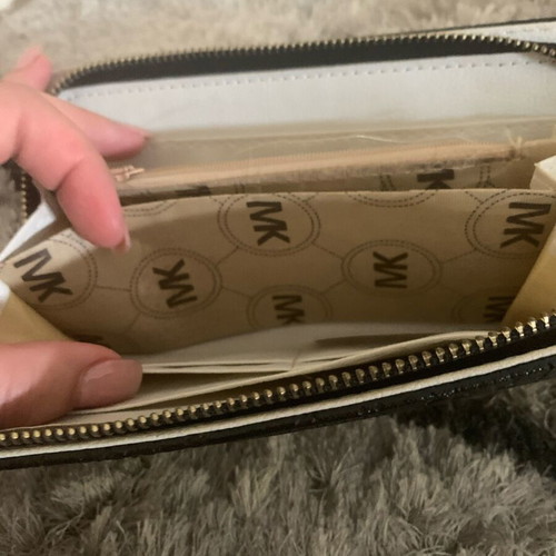 Michael Kors women's wallet black like new with broken zipper