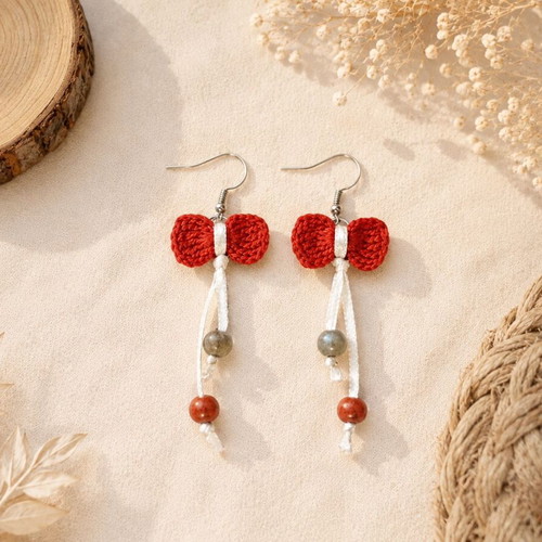 Knitted earrings with red bow, handmade