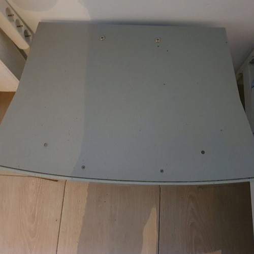 Metal TV stand with two glass shelves and built-in clock, like new
