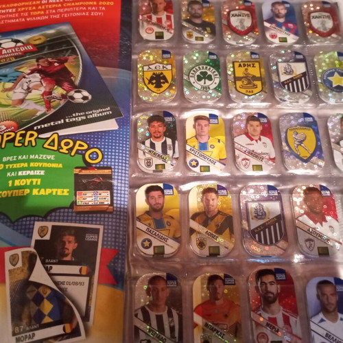 Super League collectible album with 44 metal tags used