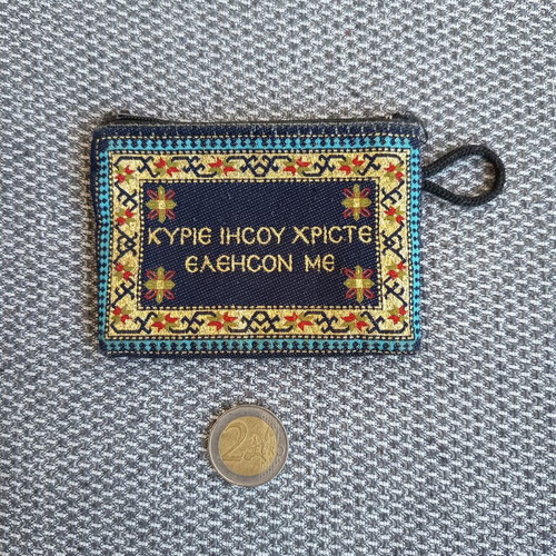 Wallet with religious inscriptions used, small with decorative designs