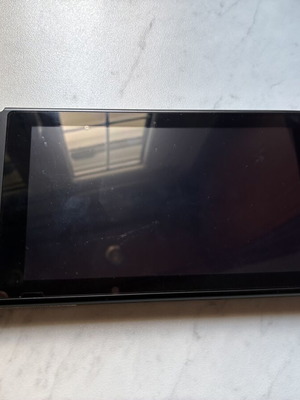 Nintendo Switch V2 console used with 2 games and carrying case