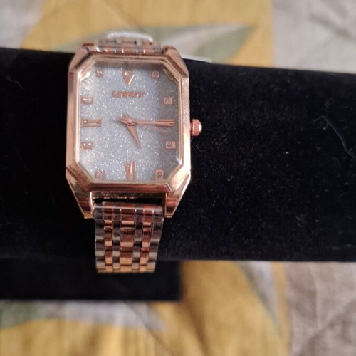Wristwatch new, pink gold and silver with bracelet
