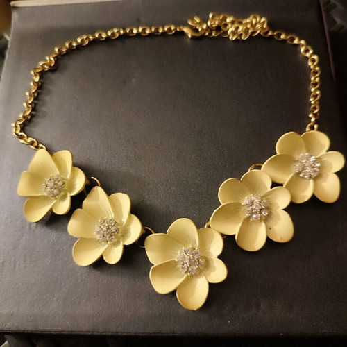 Accessorize romantic gold necklace with white flowers and rhinestones like new