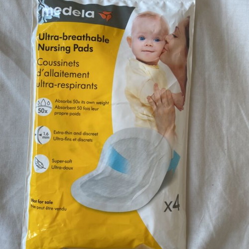 Nursing bra like new beige with free Medela pads, size M