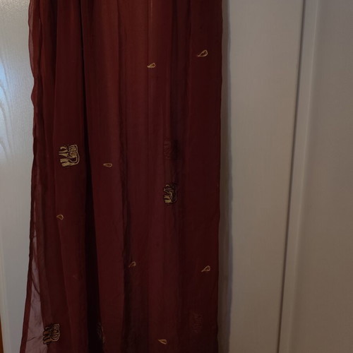 Long brown scarf used with embroidered elephants and paisley